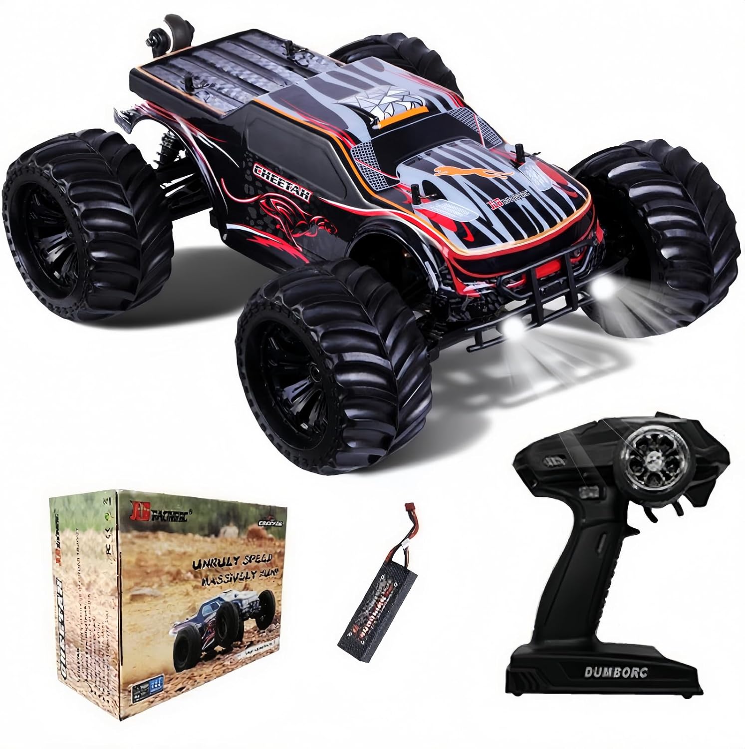 JLB Cheetah 11101 black and red brushless monster truck with its LED headlights lit, shown with the retail box, LiPo battery and 2.4GHz pistol transmitter